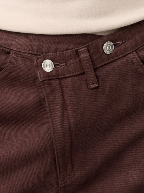 Wijde jeans met asymmetrische knoopsluiting - Kiabi