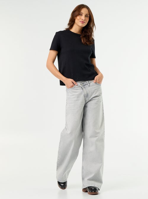 Wijde jeans met asymmetrische knoopsluiting - Kiabi