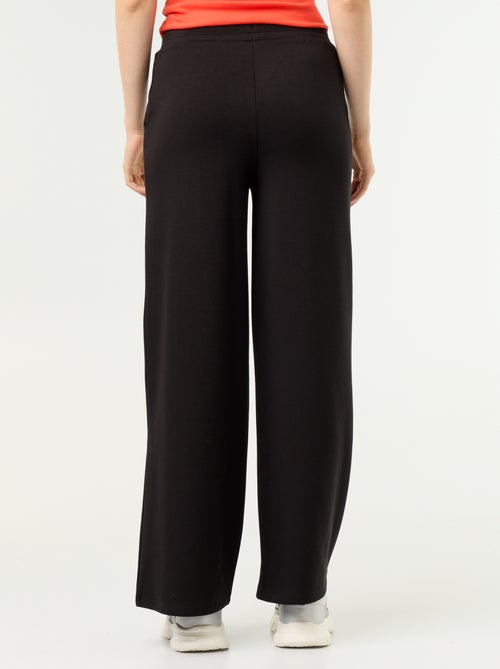 Wijde soft touch-broek - Kiabi Wijde soft touch-broek - Kiabi