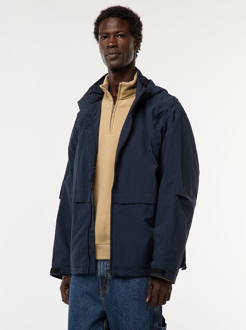 Windjack met capuchon en afneembare mouwen - Kiabi