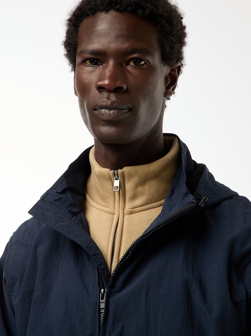 Windjack met capuchon en afneembare mouwen Blauw - Kiabi