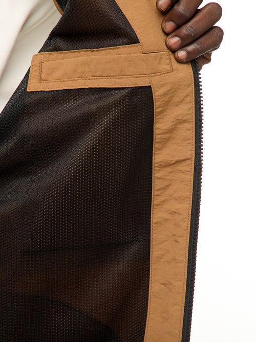 Windjack met capuchon en afneembare mouwen - Kiabi