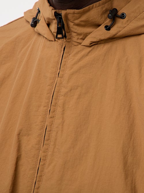 Windjack met capuchon en afneembare mouwen - Kiabi